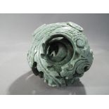 A Chinese hardstone puzzle ball with depiction of dragon and phoenix,