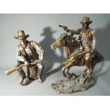 Two bronzed figurines depicting John Wayne largest approx 28cms (h) [2]