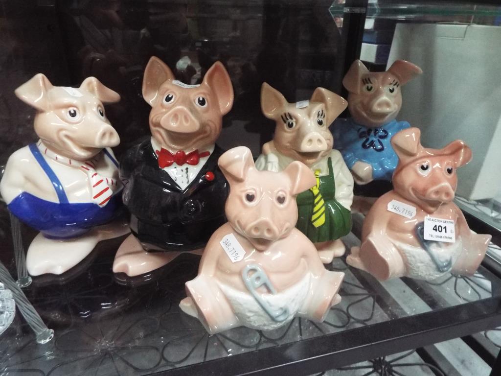 Six Wade Nat West pigs with stoppers