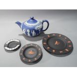 Wedgwood - two pieces of basalt black with orange detailing and Egyptian theme and two further