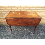 A good quality oak drop leaf table,