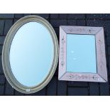 Two mirrors, the first oval shaped measu