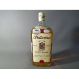 A bottle of Ballantine's finest Scotch whisky,