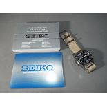 A gentleman's Seiko solar divers wristwatch water resistant to 100 mtrs Some light surface