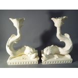 Wedgwood - a pair of Wedgwood candlesticks in the form of fish Condition One candlestick has a