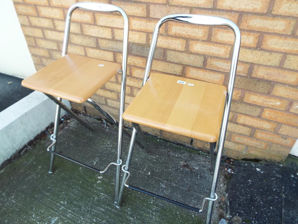 Two modern breakfast stools [2] This lot must be paid for and removed no later than close of