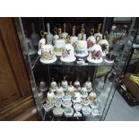 24 limited edition ceramic bells by Danbury Mint The Summer Collection,