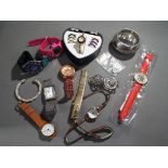 A collection of eight wrist watches Xonix, Lacoste and similar,