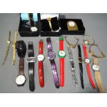 A large quantity of wristwatches to include Sekonda, Timex, Royal, Gossip, Seiko, Swiss Army, Joy,