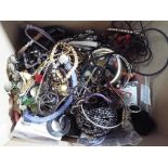 A boxed containing a quantity of predominantly modern costume jewellery, to include necklaces,