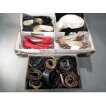 A quantity of fashion belts predominantly leather by Jaeger and similar,