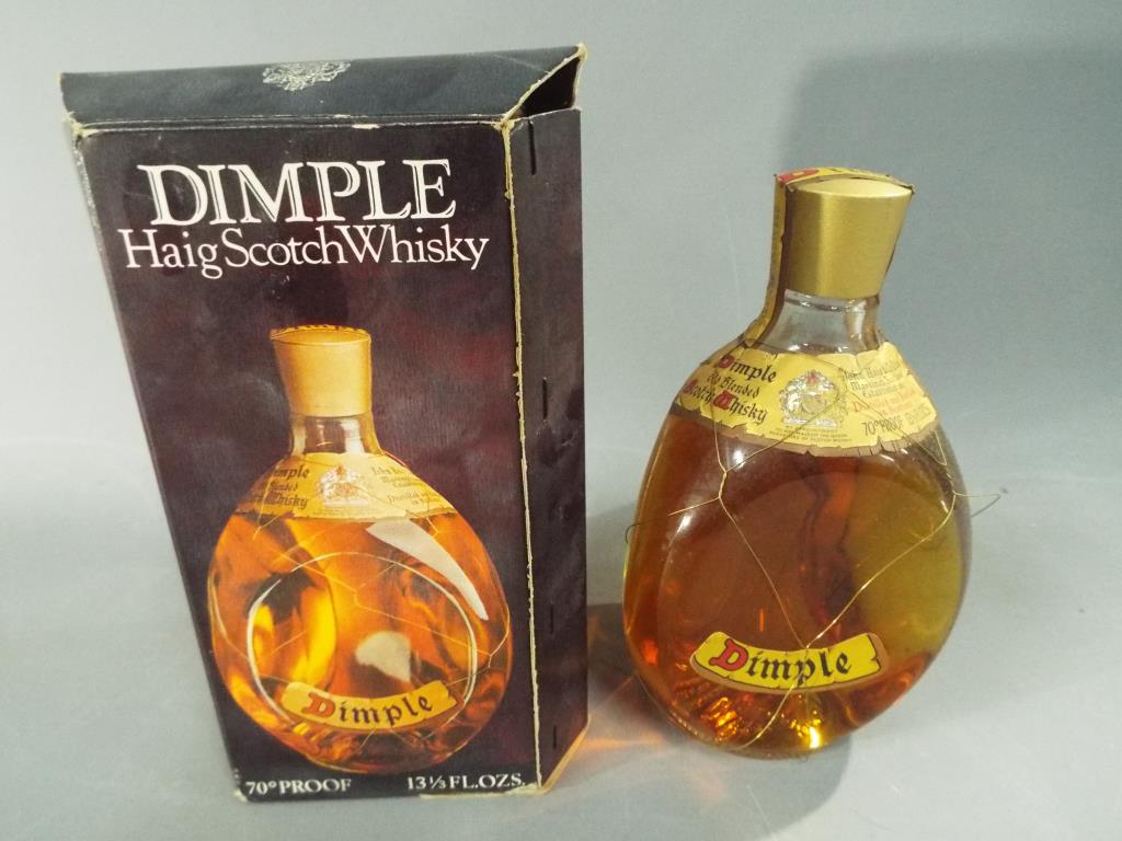 A probable 1970's bottling of Haig Dimple Scotch whisky, 13 1/3 fl oz, 70° proof, - Image 2 of 2