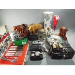 A good mixed lot of vintage cameras, ceramics, wooden animals and flatware,