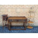 An Old Charm console table with two drawers measuring approximately 77 cm x 106 cm x 43 cm,