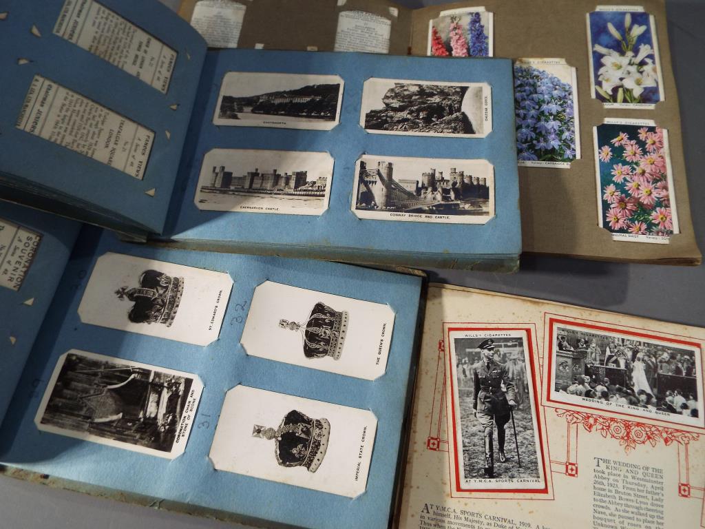 Four cigarette card albums containing complete sets of famous UK landmarks, - Image 2 of 2