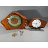 A Smiths mantel clock with key and pendulum and a Metamec electric clock.