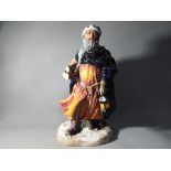 Royal Doulton - a Royal Doulton figurine in the Good King Wenceslas shape,