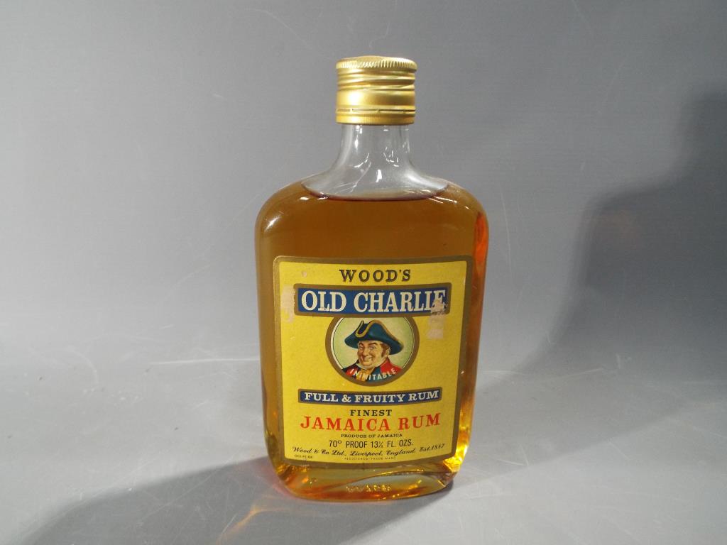 Rum - 13 1/3 fl. oz bottle of Wood's Old Charlie Jamaica Rum 70 proof.