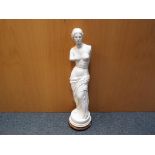 A plaster figure depicting the Venu De Milo,