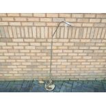 A brass standard lamp approximately 160 cm (h) This lot must be paid for and removed no later than