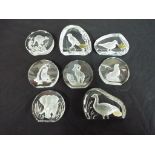 Eight clear glass/crystal paperweights all by Danbury Mint and Wedgwood (8) This lot must be paid