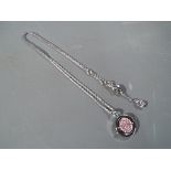 Swarovski - a Swarovski white metal necklace with Swarovski crystal pendant,