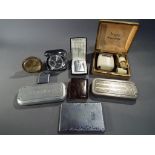 A small collection of vintage collectibles to include Ronson cigarette lighters, cigarette cases,