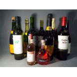 A collection of alcoholic beverages to include Veuve Clicquot, Prosecco, Cabernet Sauvignon,