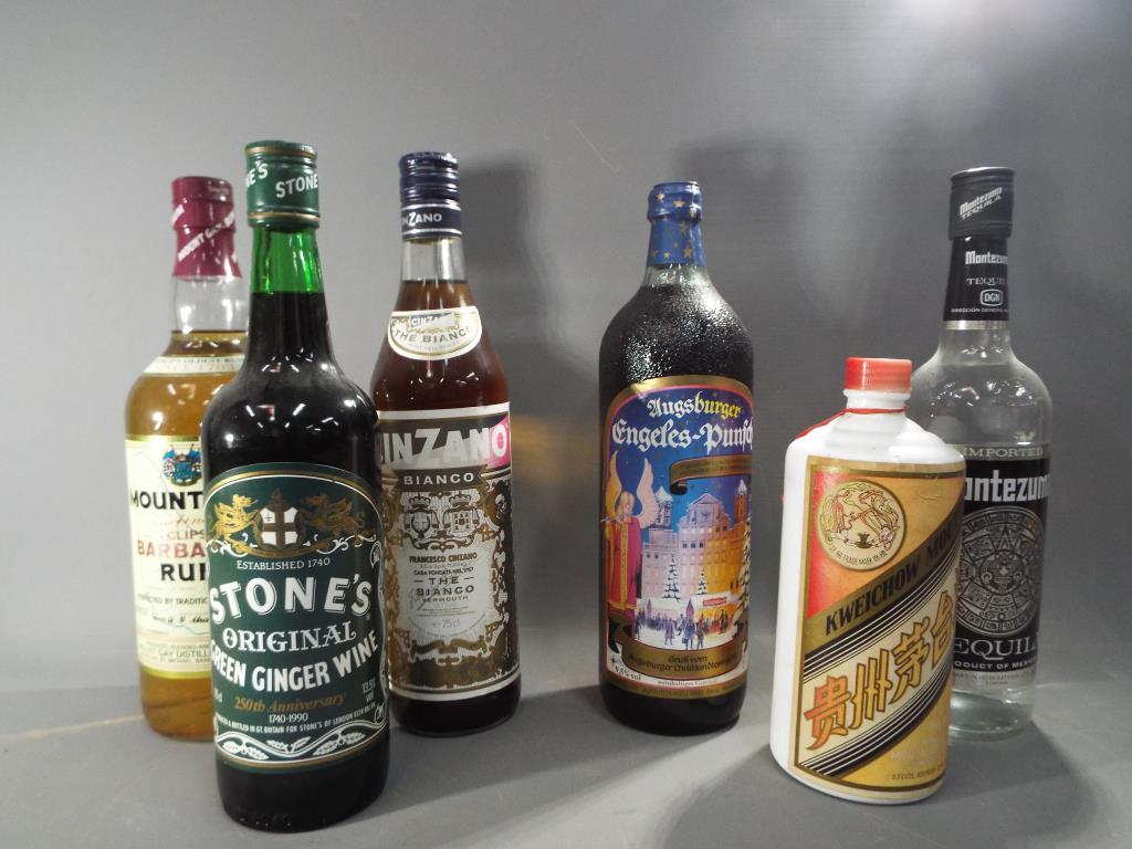 Six bottles of drink to include 70 cl bottle of Montezuma tequila ,