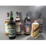 Six bottles of drink to include 70 cl bottle of Montezuma tequila ,