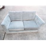 A modern two seater upholstered sofa This lot must be paid for and removed no later than close of