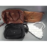 Handbags - four handbags to include a leather handbag fully lined marked Mulberry and three further