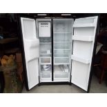 A large Samsung American style fridge freezer with ice and water dispenser approx 177cm x 91cm x