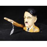 A cast iron nutcracker in the form of Hitler (mechanism works,