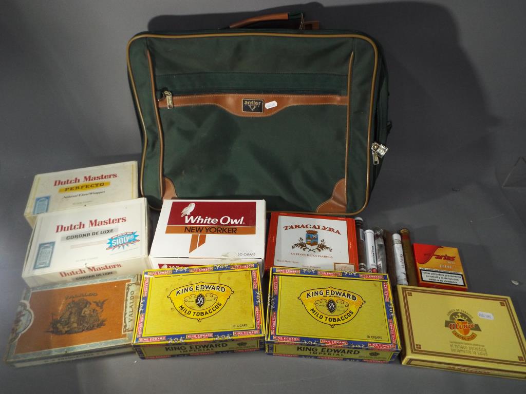 A holdall containing a quantity of cigars (some boxes opened) including Hoyo De Monteray,