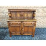 A sideboard measuring approximately 124 cm x 122 cm x 49 cm.