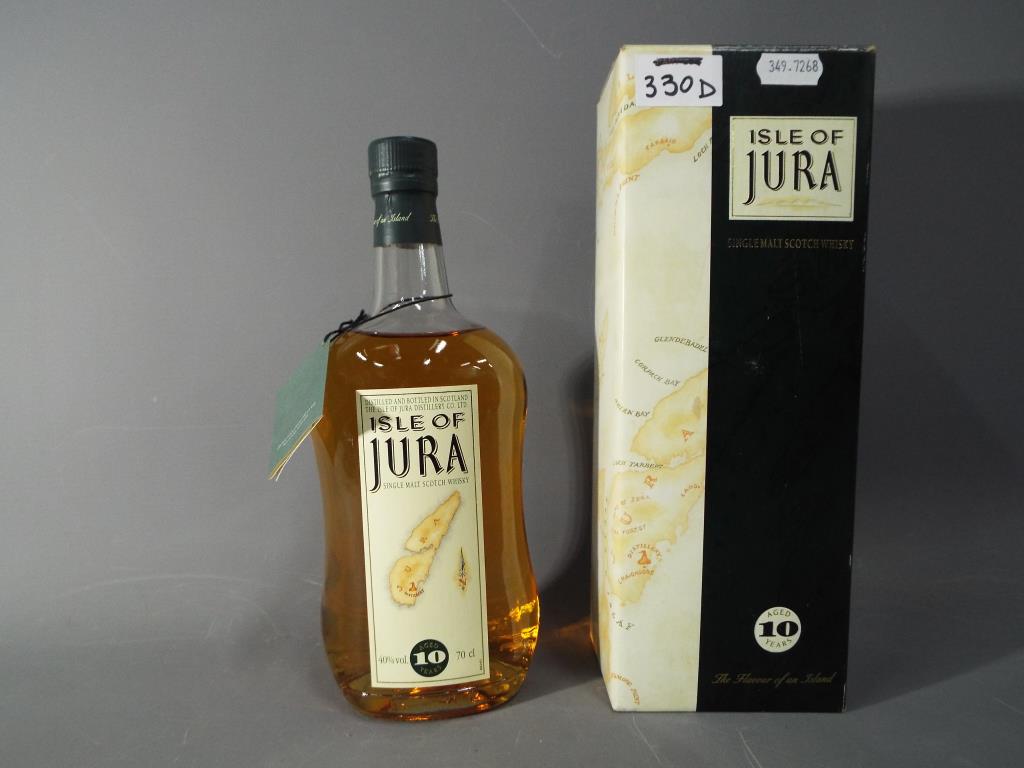 A bottle of Isle of Jura single Malt Scotch whisky, aged 10 years, old style,