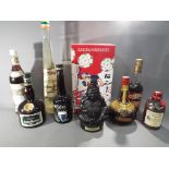 Eight bottles of drink to include Bols cherry brandy, Creme De Grand Marnier,