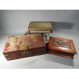 Three small decorative storage boxes, the largest approximately 10 cm x 30 c m x 20 cm.