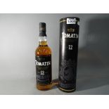A bottle of 12 year old Tomatin single Highland Malt Scotch whisky,