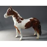 Beswick - a Beswick Skewbald Pinto Pony This lot must be paid for and removed no later than close