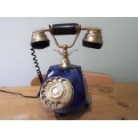 A vintage Italian salon telephone with faceted blue glass body with gilded metal mounts,