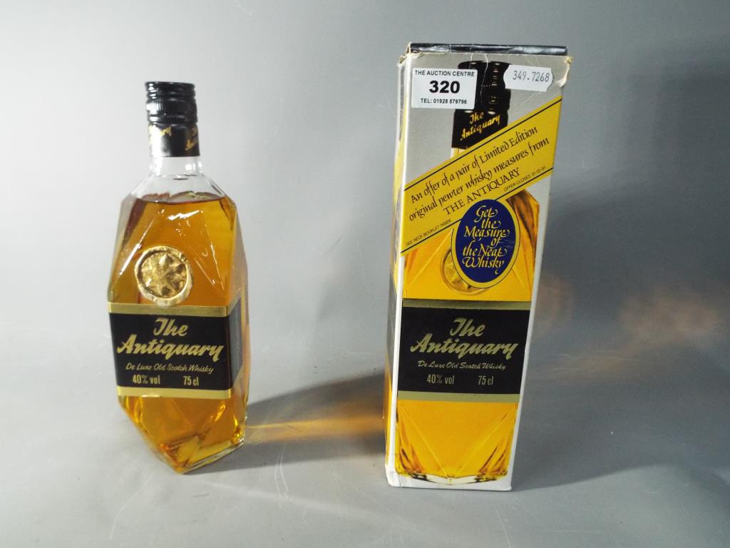 A bottle of Antiquary De Luxe old Scotch whisky 75cl 40% (1980's) This lot must be paid for and