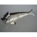 A Spanish articulated silver model of a fish,