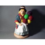 Royal Doulton - a Royal Doulton figurine in the Balloon Girl shape,