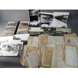 A collection of railway related photographs and ephemera.