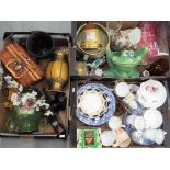 A mixed lot to include ceramics, glassware and similar over three boxes.