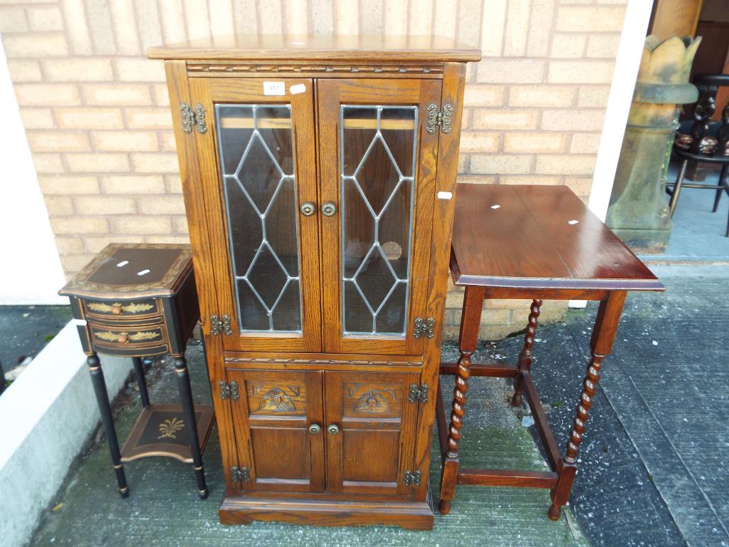 A good lot comprising an Old Charm music cabinet with twin glazed doors, approx 114cm x 54cm x 50cm,