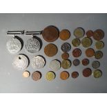 Lot to include a small quantity of UK and foreign coins and a WWII Defence Medal and War Medal.