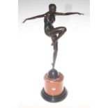 Bronze lady figure in dancing pose on marble plinth,